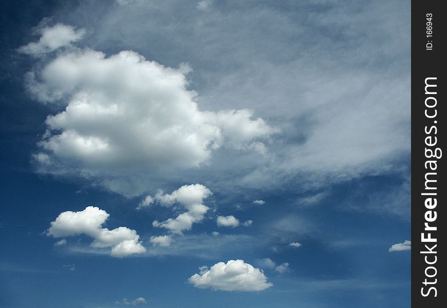 Clouds on blue sky.