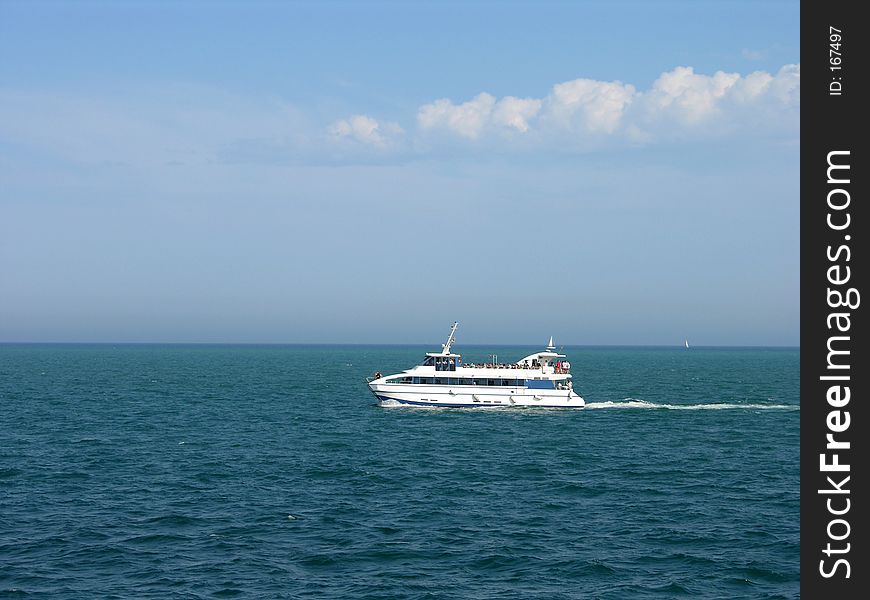 White Speed Boat Cruising. White Speed Boat Cruising