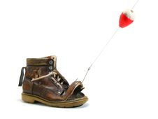 What Disappointment! A Shoe Instead Of A Fish Royalty Free Stock Photo What Disappointment! A Shoe Instead Of A Fish Royalty Free Stock Photo