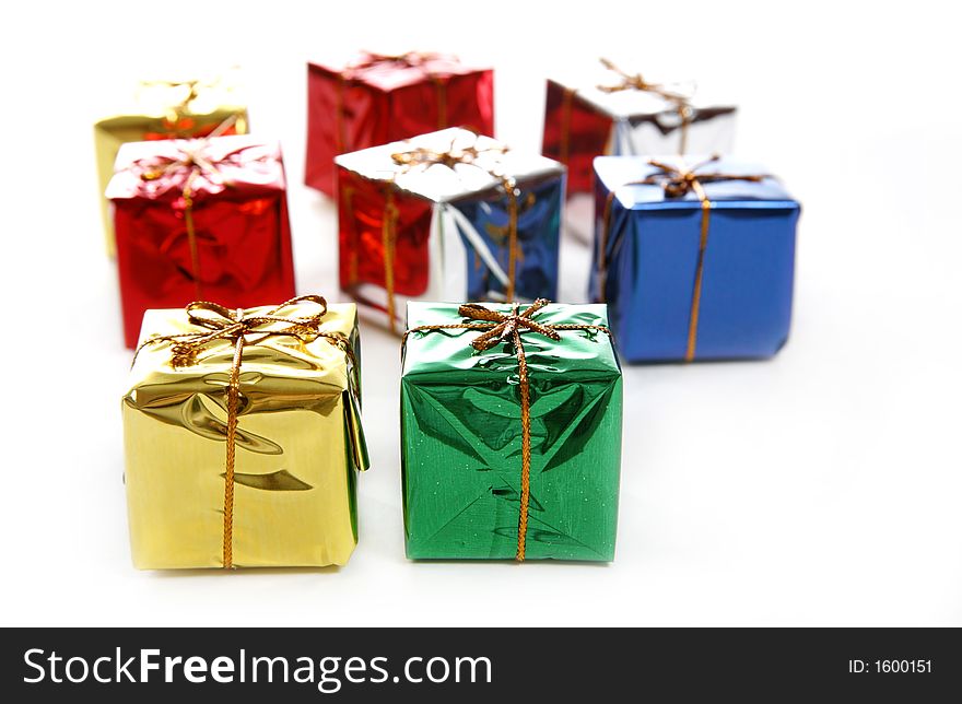 Bunch of colorful mini gifts on white