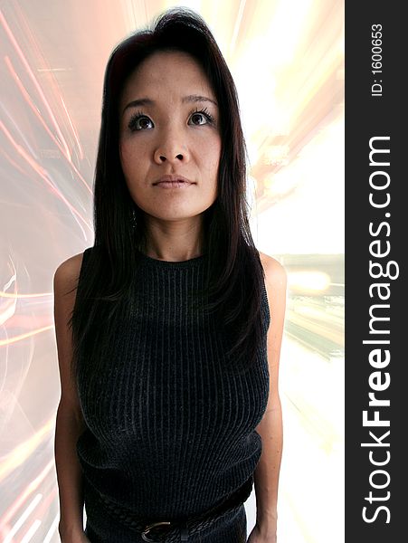 Experimental studio shot of japanese woman with abstract lights overlayed