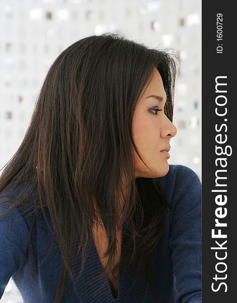 Studio shot of japanese woman looking sideways. Studio shot of japanese woman looking sideways