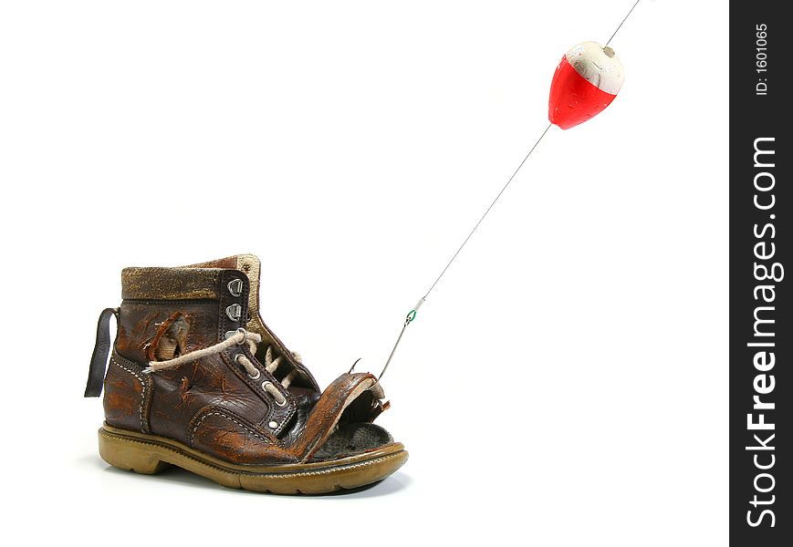 Catching an old shoe with a fishing pole. White background. Catching an old shoe with a fishing pole. White background