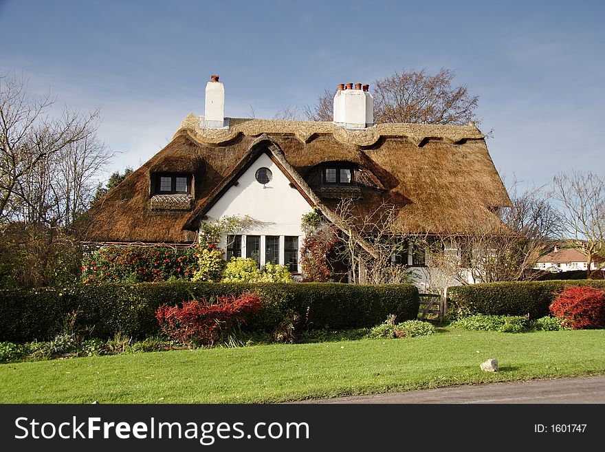 Thatched Cottage in a Rural Village in England. Thatched Cottage in a Rural Village in England