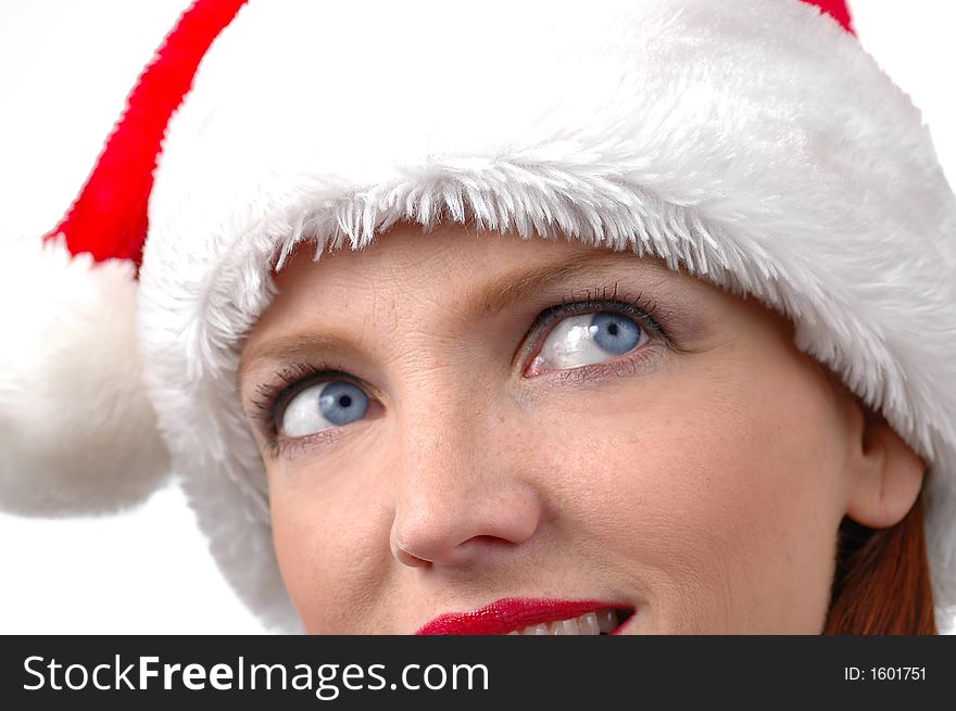 Portrait of woman wearing Santa's hat with white background