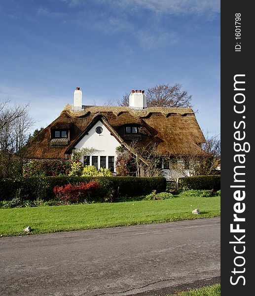 Thatched Cottage in a Rural Village in England. Thatched Cottage in a Rural Village in England