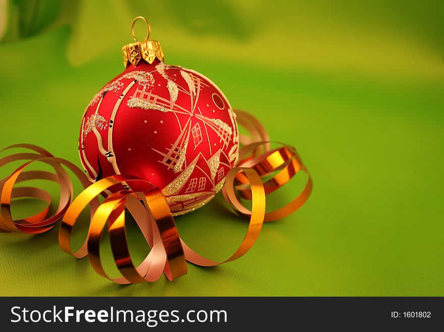 Christmas bauble on a green background
