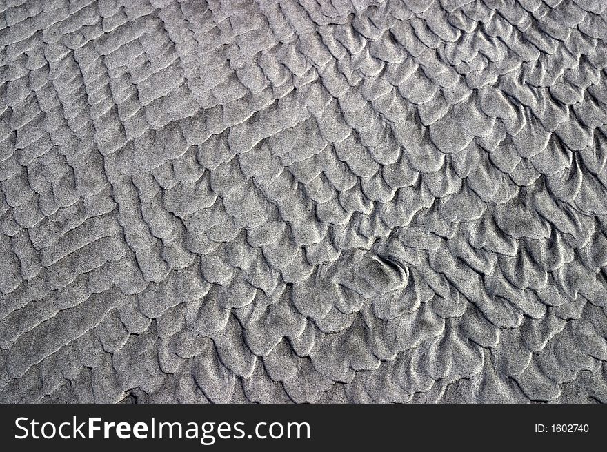 Rippling sand on the beach. Rippling sand on the beach