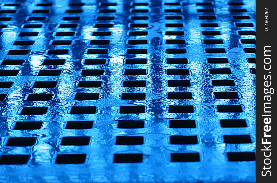 Blue design background. Old rusty airport seat in blue light. Low DOF. Blue design background. Old rusty airport seat in blue light. Low DOF.