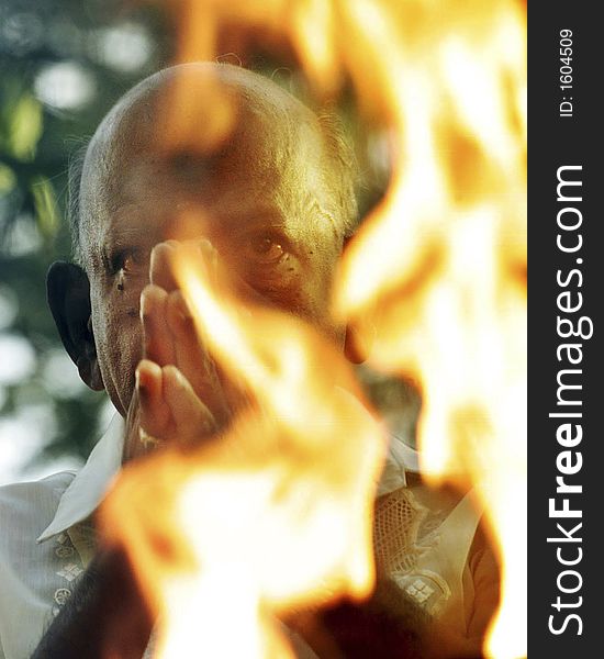 A Hindu devotee reciting prayer.