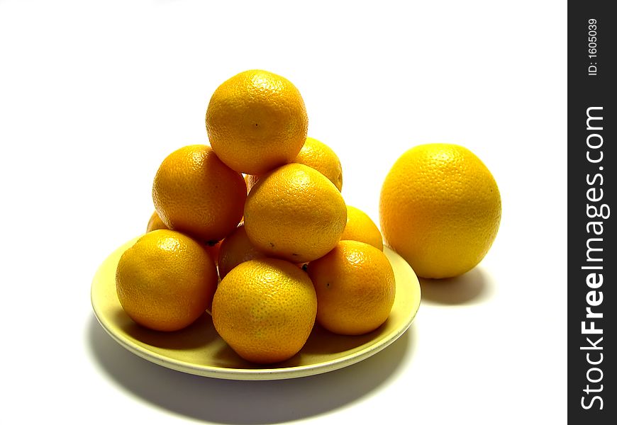Tangerines and oranges on a plate