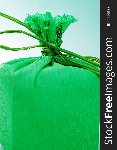 Green present with green ribbon.Present box. Green present with green ribbon.Present box.