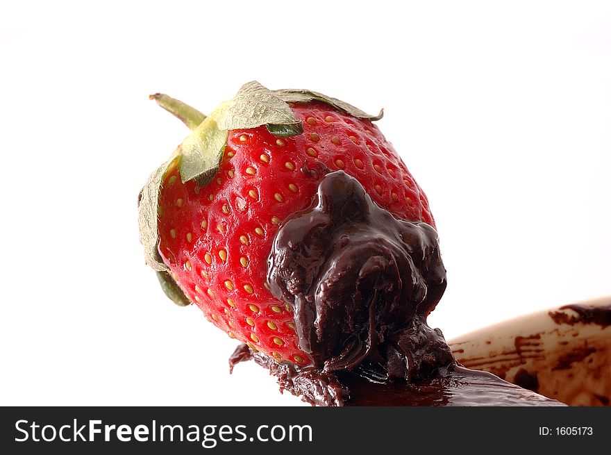 Closeup of strawberry on chocolate. Closeup of strawberry on chocolate