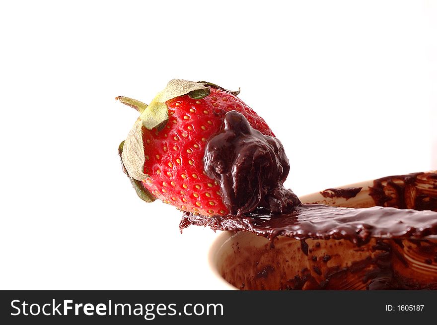 Closeup of strawberry on chocolate. Closeup of strawberry on chocolate
