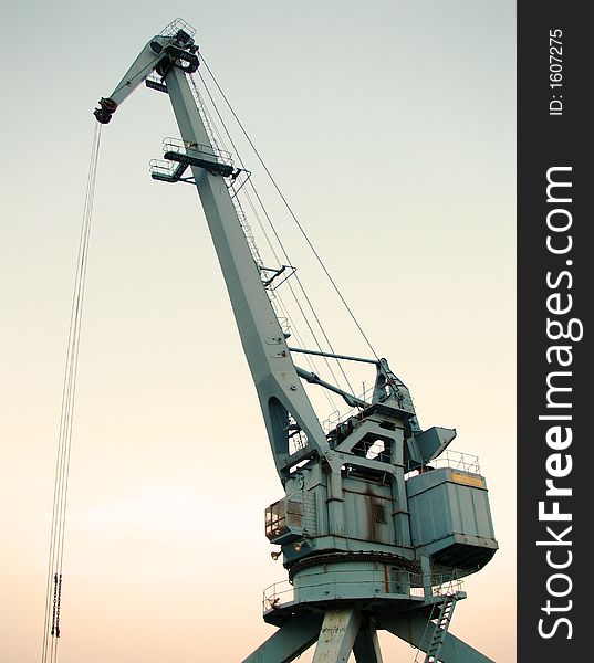 The large gray iron crane