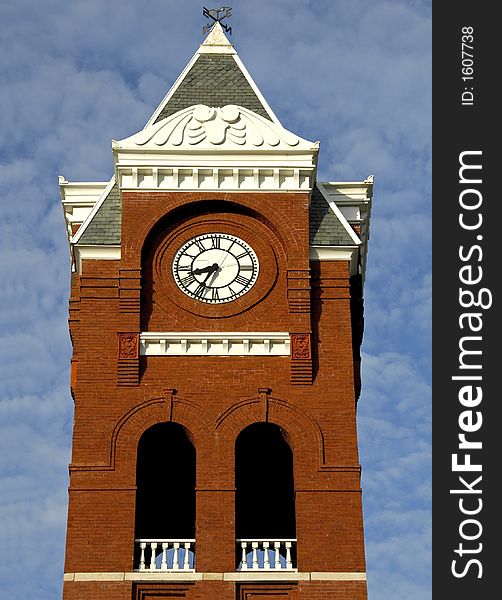 Clock tower on old courthouse building in rural southern city. Clock tower on old courthouse building in rural southern city