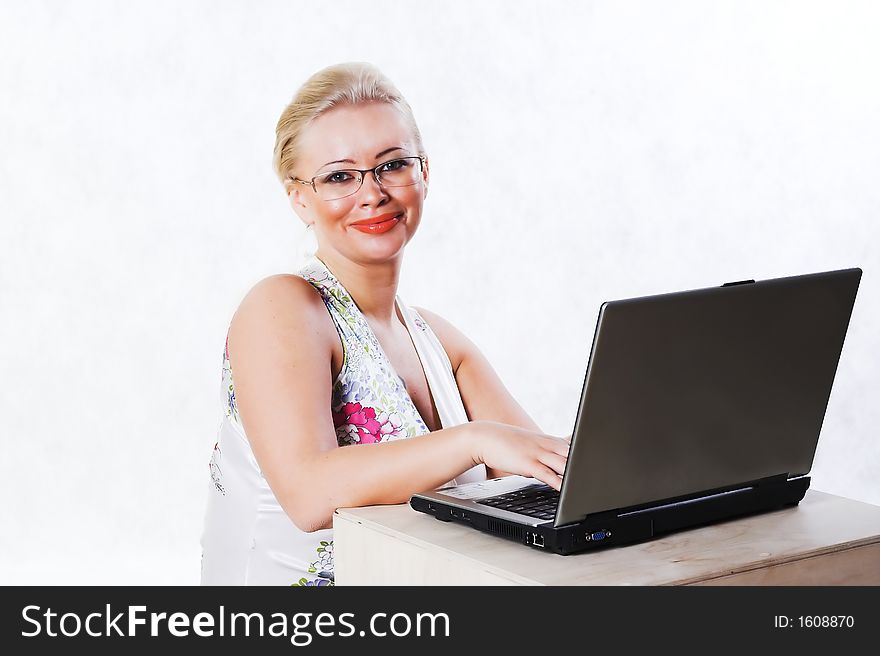 Business woman working with notebook. Business woman working with notebook