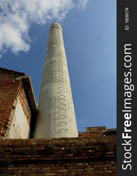 A factory chimney on the Venetian island of Murano, where glass is made.