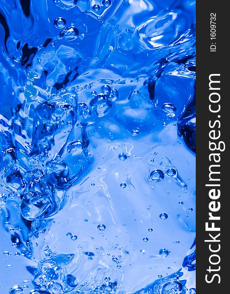 The blue water splash as abstract background