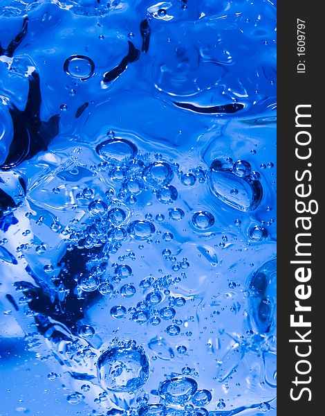 The blue water splash as abstract background