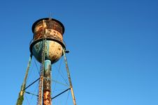 Old Rusty Watertower Against Blue Sky Royalty Free Stock Images