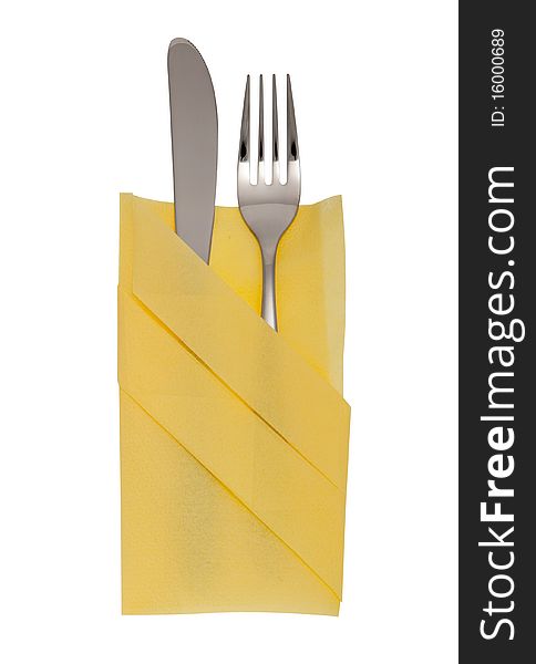 Fork and knife with clipping path, cutlery in elegant yellow table napkin