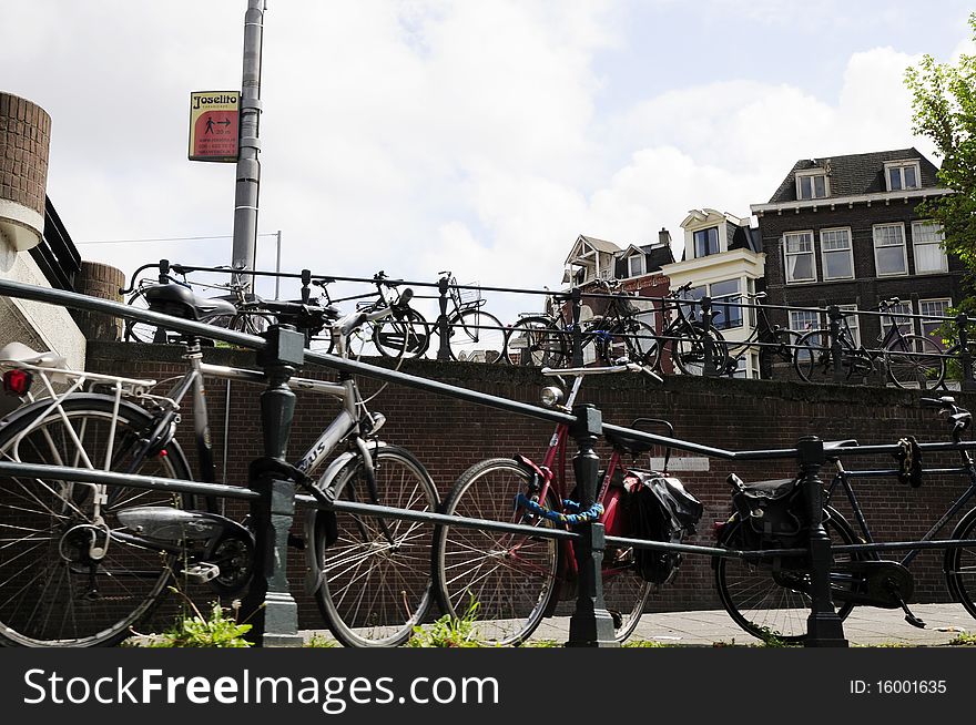 Street full of bicycle in amsterdam city