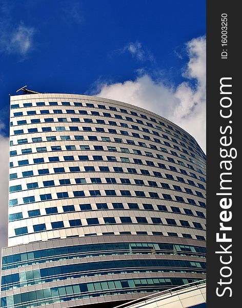 Modern bussines building with clear blue sky in the background. Modern bussines building with clear blue sky in the background