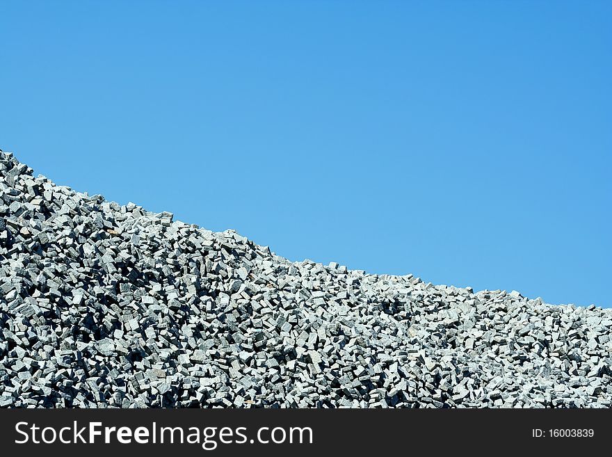 Granite Stone Pile With Blue Sky