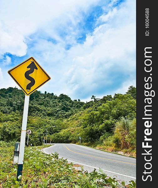 Sign of curve road on mountain