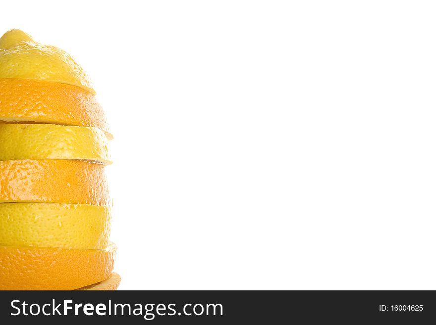 Slices of lemon and orange are on each other. Lots of copyspace and room for text on this isolate