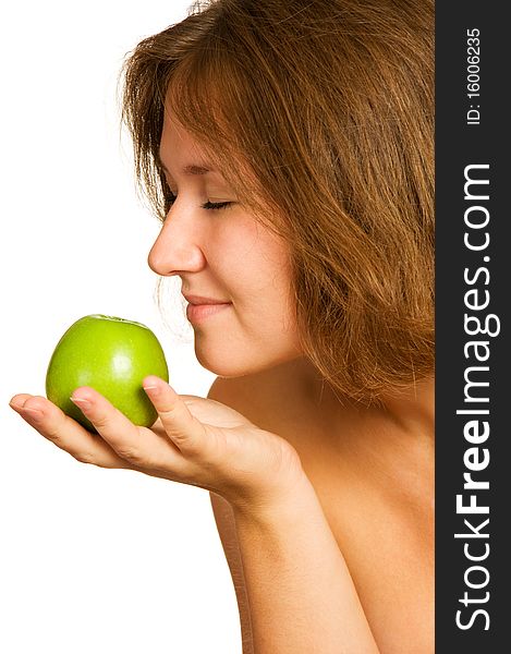 Cute woman smelling fresh apple over white. Cute woman smelling fresh apple over white