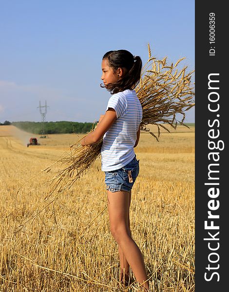 Young Gypsy Girl On A Grain Field