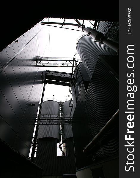 Industrial concept background ladders tanks bw. Industrial concept background ladders tanks bw