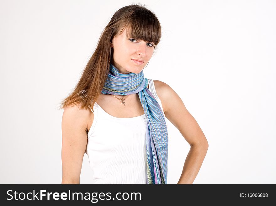 Girl in ethnic clothes posing in studio