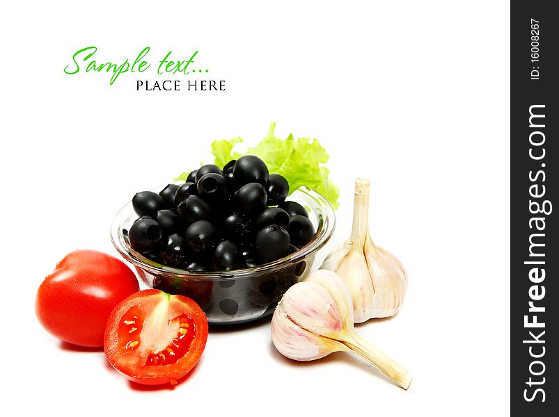 Tomatoes and black olives isolated on a white background.