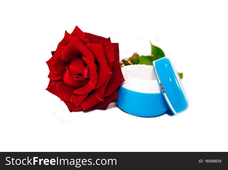 Cosmetic creams and roses isolated on white background. Cosmetic creams and roses isolated on white background