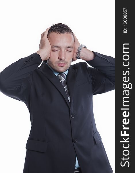 Young businessman is having headache and business problems. Young businessman is having headache and business problems