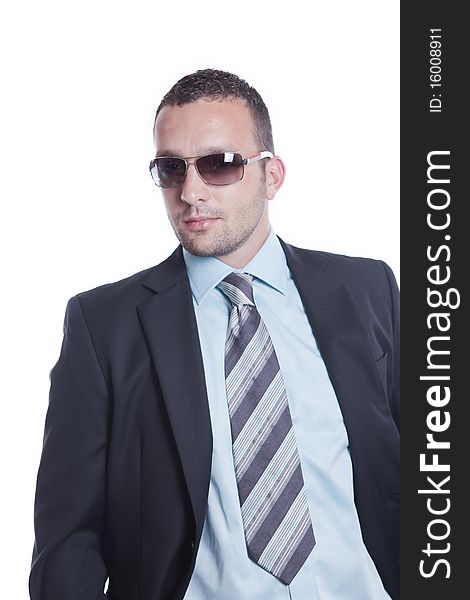 Young businessman with sunglasses, isolated on white