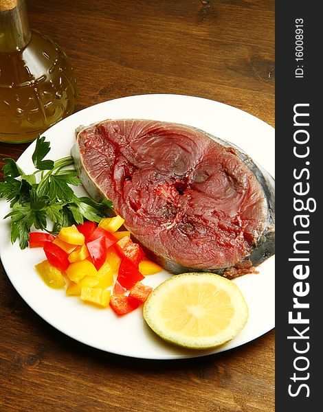 Sliced raw tuna with lime,herbs and pepper. Sliced raw tuna with lime,herbs and pepper