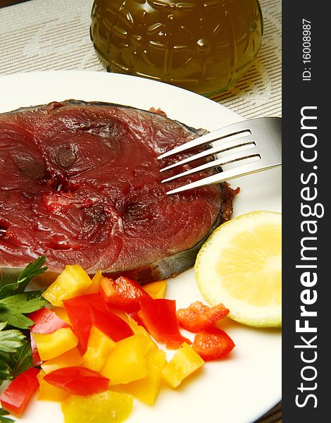 Sliced raw tuna with lime,herbs and pepper. Sliced raw tuna with lime,herbs and pepper