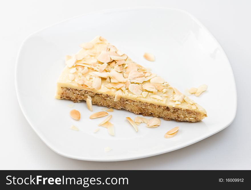 A piece of traditioanal almond cake on a plate