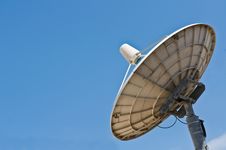 White Satellite Dish With Blue Sky Stock Image