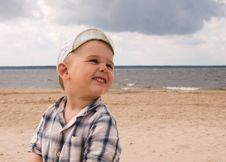 Smiling Boy On A Beach Stock Image Smiling Boy On A Beach Stock Image