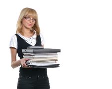 A Young Businesswoman With A Pack Of Documents Royalty Free Stock Photography