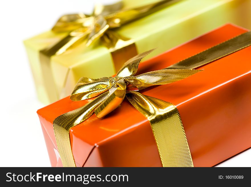 Christmas Time,Gift box with golden ribbon,isolated on the white background