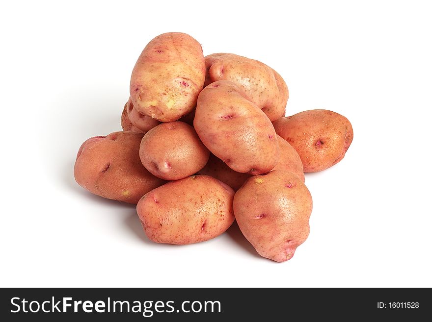 The red french miniature potatoes isolated on white. The red french miniature potatoes isolated on white