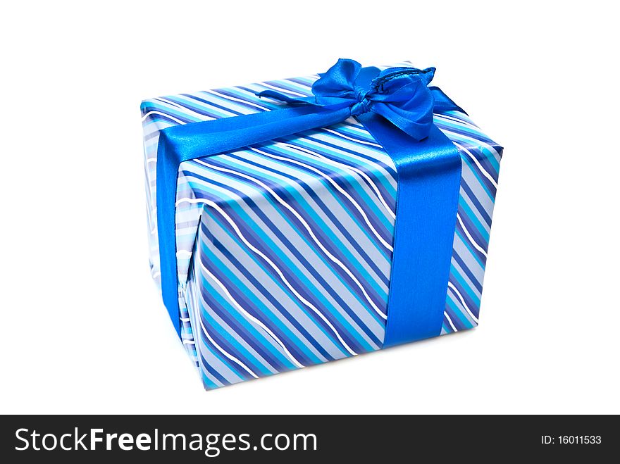 Blue paper gift box with bow. Isolated on white.
