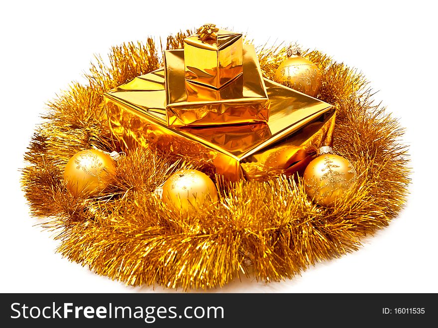 Yellow gifts boxes with christmas balls. Isolated on white