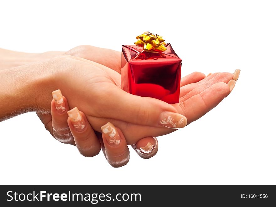 Small red present in woman's hands. Isolated on white. Small red present in woman's hands. Isolated on white